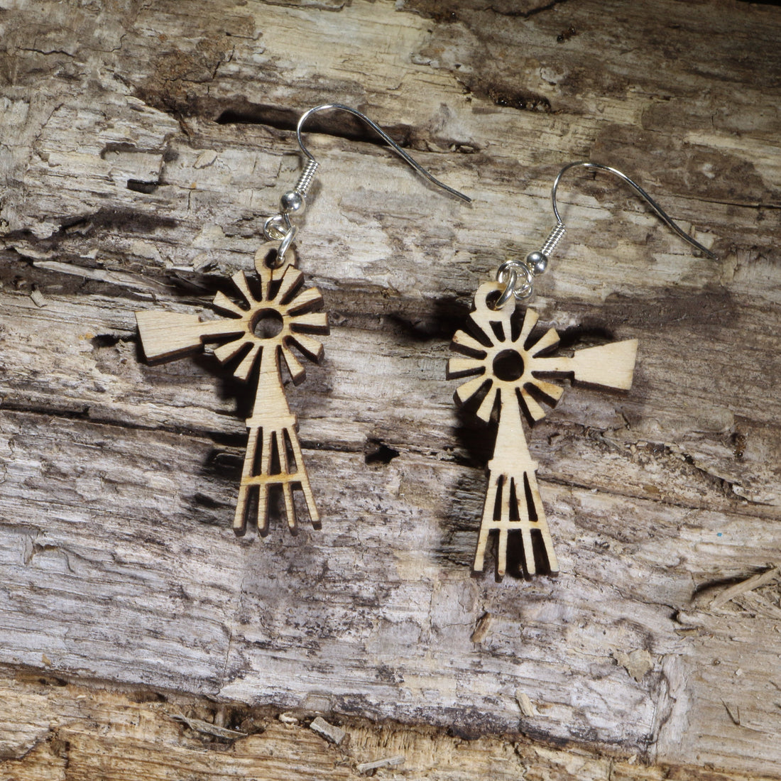 Hand-painted wooden windmill dangle earrings on hypoallergenic .925 sterling silver hooks. Lightweight windmill jewelry inspired by rustic farm life, prairie landscapes, Dutch heritage, and country living.