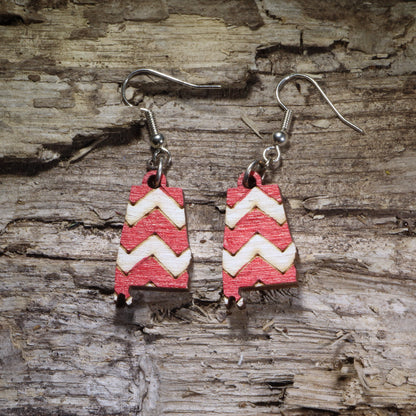 Handcrafted Alabama state wooden dangle earrings featuring a red and white chevron pattern inspired by the Alabama state flag. Lightweight laser-cut wooden earrings with hypoallergenic .925 sterling silver hooks, perfect for Alabama pride, Southern style, state souvenirs, hometown gifts, and handmade state jewelry.