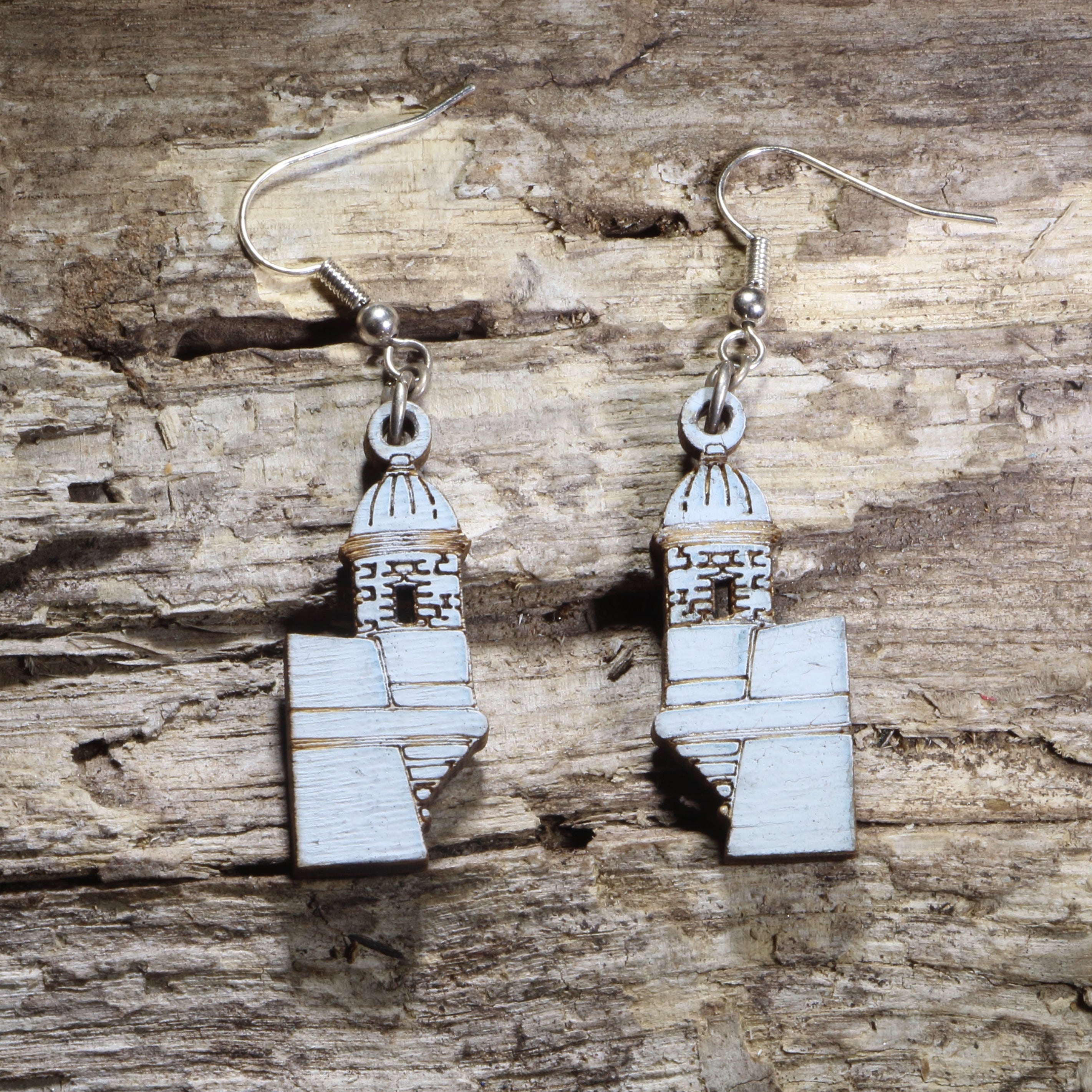 Handcrafted El Morro wooden dangle earrings featuring the iconic Castillo San Felipe del Morro fortress in Puerto Rico. Lightweight laser-cut wooden earrings with hypoallergenic .925 sterling silver hooks, perfect for Puerto Rican pride, Boricua heritage, Caribbean travel lovers, historic landmark enthusiasts, and unique cultural jewelry.