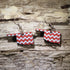 Handcrafted Oklahoma-shaped wooden dangle earrings featuring a bold red and white chevron pattern. Lightweight Oklahoma state earrings with hypoallergenic .925 sterling silver hooks, perfect for Oklahoma pride, southern style, western fashion, college game day outfits, and unique handmade statement jewelry.