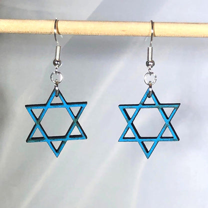 Handcrafted Star of David wooden dangle earrings featuring a hand-painted blue six-pointed Jewish star design. Lightweight laser-cut wooden earrings with hypoallergenic .925 sterling silver hooks, perfect for Jewish faith, Hanukkah celebrations, synagogue events, Bat Mitzvah gifts, Jewish heritage, and handmade religious jewelry.
