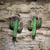 Handcrafted saguaro cactus wooden dangle earrings featuring a hand-painted green desert cactus with blooming purple flowers. Lightweight laser-cut wooden earrings with hypoallergenic .925 sterling silver hooks, perfect for Southwest style, Arizona lovers, desert enthusiasts, cactus collectors, succulent fans, and handmade botanical jewelry.