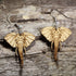 Handmade elephant wooden dangle earrings crafted from lightweight laser-cut wood with hypoallergenic .925 sterling silver hooks. African wildlife jewelry featuring a detailed elephant face, perfect for elephant lovers, safari enthusiasts, zoo supporters, nature lovers, and unique animal gifts.