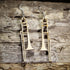 Handmade wooden trombone dangle earrings crafted from lightweight laser-cut wood with hypoallergenic .925 sterling silver hooks. Detailed brass instrument earrings make a perfect gift for trombone players, music teachers, orchestra musicians, jazz bands, and marching band enthusiasts.