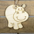 Hand-painted wooden happy hippo Christmas ornament with cute animal design and lightweight festive decor, playful woodland tree decoration for cozy and whimsical holiday style