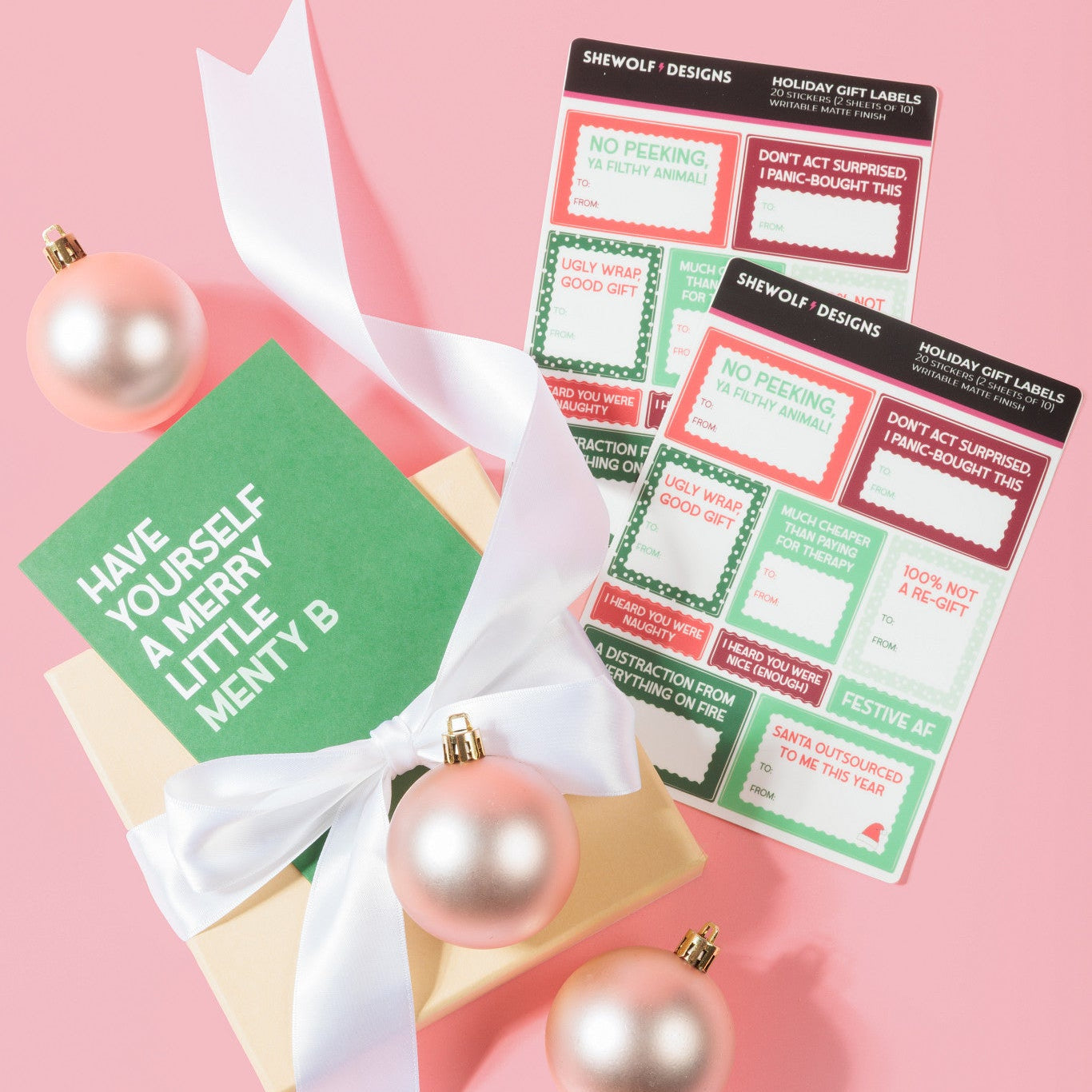 A styled flat-lay of a green greeting card that reads &