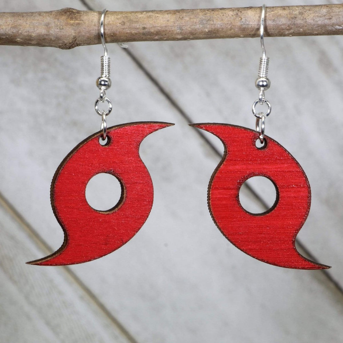 Hand-painted wooden hurricane symbol dangle earrings with swirling weather storm design and hypoallergenic sterling silver hooks, lightweight hurricane statement jewelry earrings for meteorology lovers and bold style