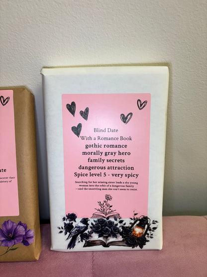 Book with a pink cover and text on a white background