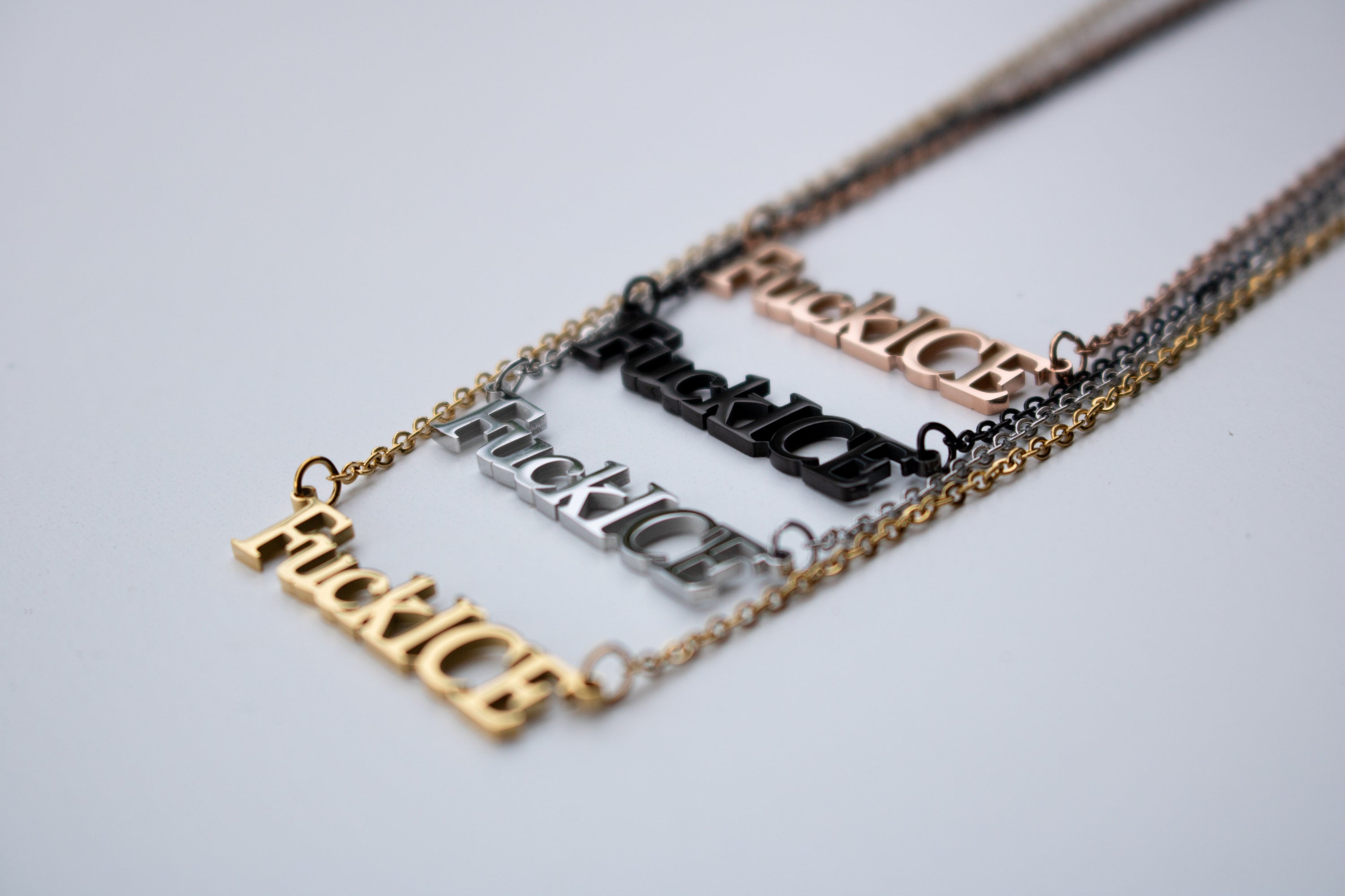Fuck ICE Cutout Necklace - $10 from each necklace donated to National Immigrant Justice Center