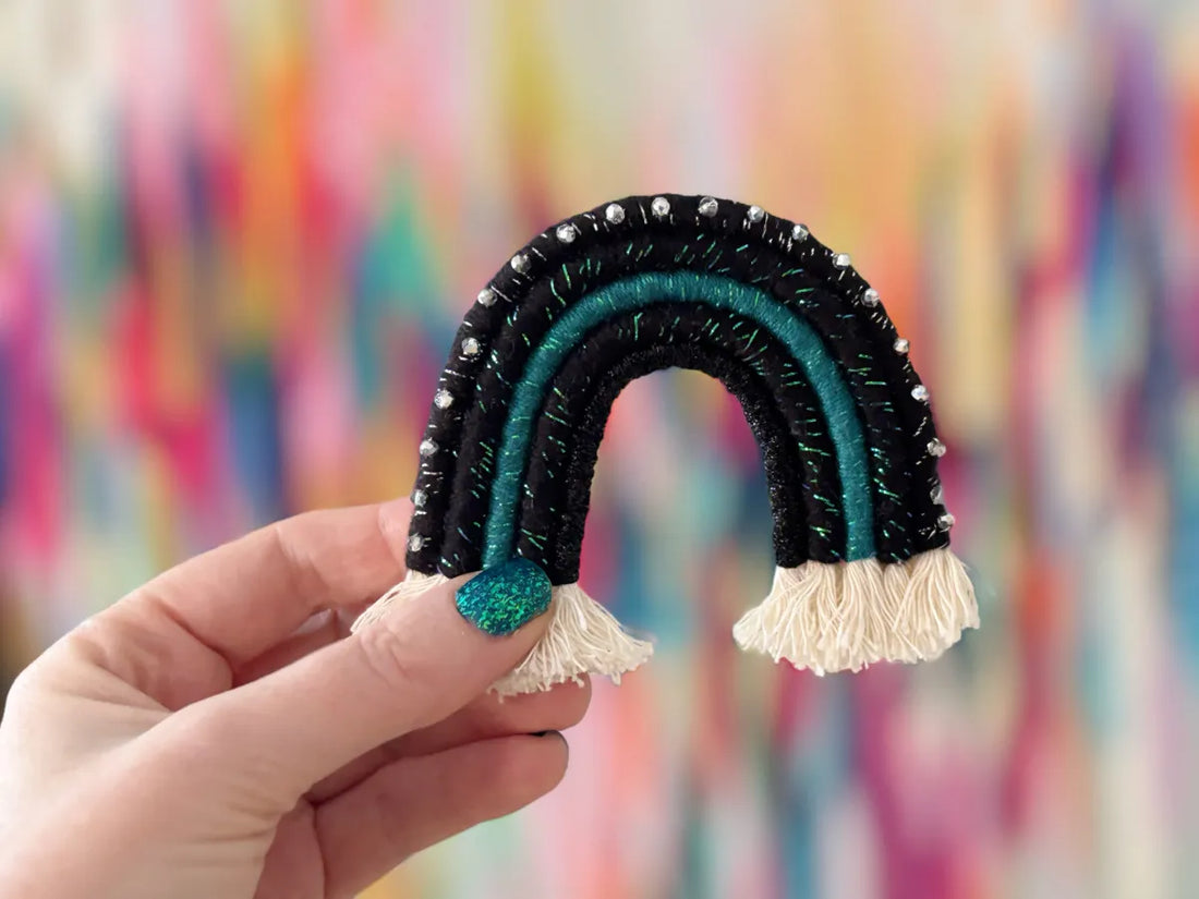 handmade black and teal fiber art rainbow