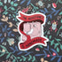 Sticker with sewing machine graphic and &