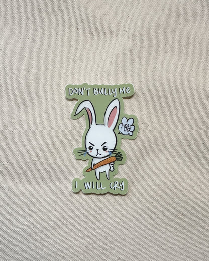 Sticker with a cartoon rabbit holding a carrot and text that says "Don&