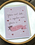 A 5x7 inch greeting card with a pink background featuring the text &