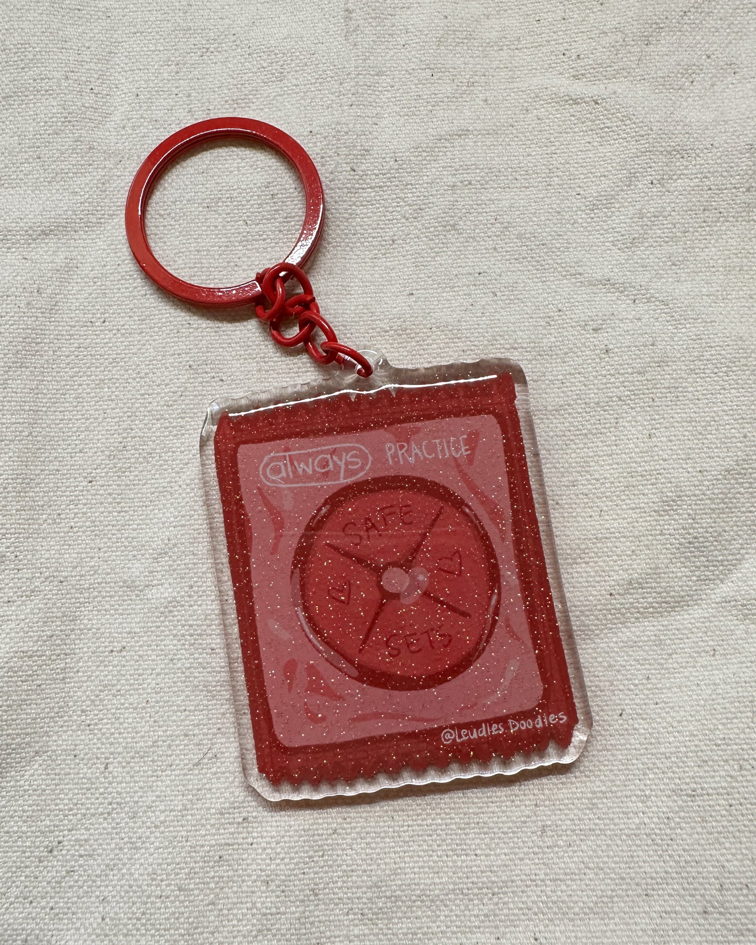 Practice Safe Sets Acrylic Keychain
