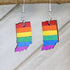 Hand-painted wooden Indiana pride flag dangle earrings with rainbow state-inspired design and hypoallergenic sterling silver hooks, lightweight LGBTQ jewelry for Indiana pride and inclusive style by Cate’s Concepts