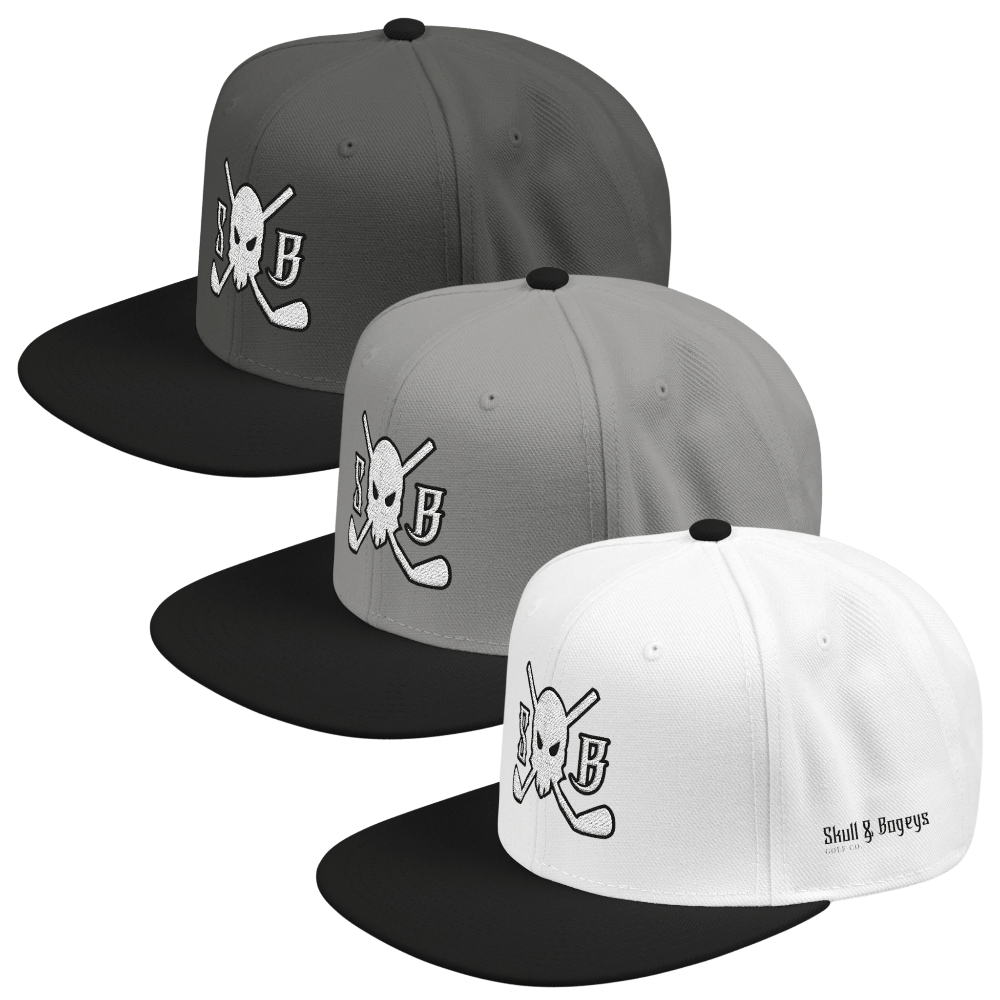 Three flat-brim snapback caps shown in gray, light gray, and white, each with a black brim and a white skull-and-crossbones graphic featuring a large letter B on the front. A small &