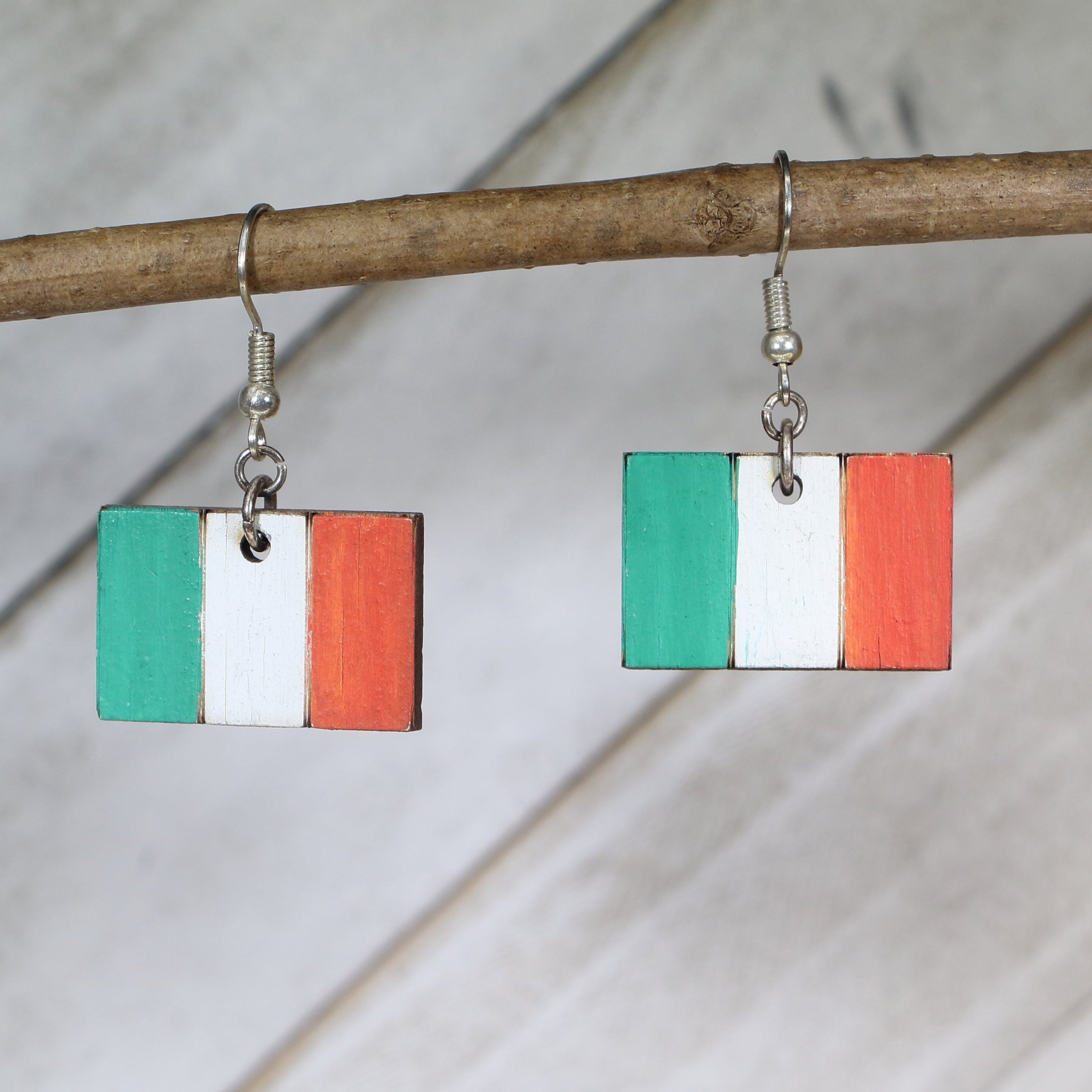 Hand-painted wooden Irish flag dangle earrings with bold Ireland pride design and hypoallergenic sterling silver hooks, lightweight patriotic jewelry for Irish heritage and festive celebrations by Cate’s Concepts