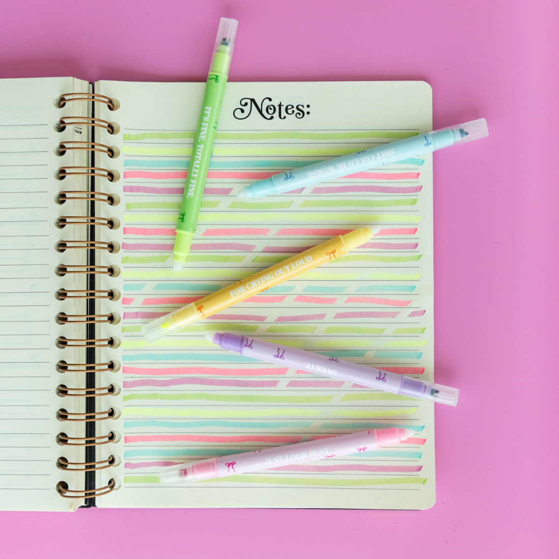 Book Club erasable highlighters close-up showing chisel tip and book-pattern designs on each pen, Jollity &amp; Co.