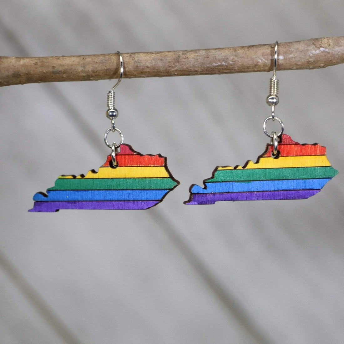 Hand-painted wooden Kentucky LGBTQ pride dangle earrings with rainbow state design and hypoallergenic sterling silver hooks, lightweight pride statement jewelry earrings for Kentucky pride and inclusive style

