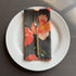 European Linen napkin with an Ember Poppies pattern on black olive