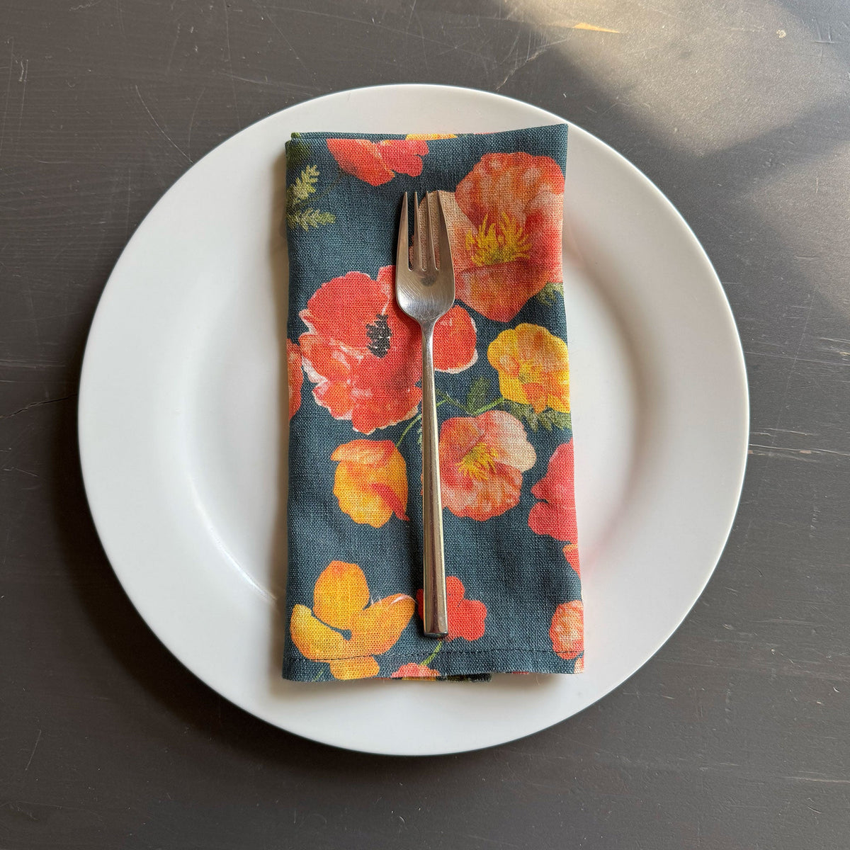 European Linen napkins in an Ember Poppies pattern on Nocturne Blue