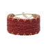 Small triangle red and gold handmade Maasai beadwork bracelet by Sidai Designs, ethical sustainable artisan jewelry brand, fair trade Tanzania