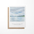A greeting card featuring a watercolor landscape painting of Lake George with a quote from Mother Theresa