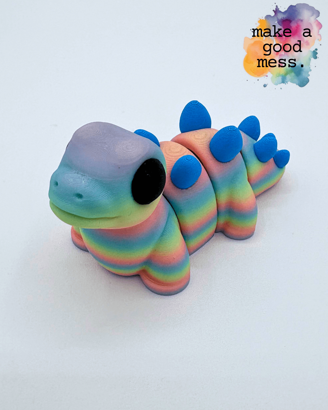 Stegosaurus Fidget Friend in Pastel Rainbow