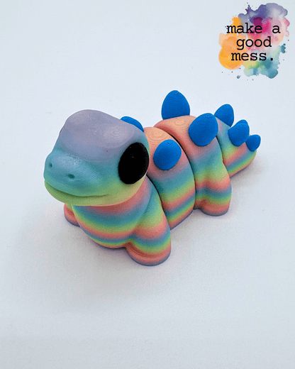 Stegosaurus Fidget Friend in Pastel Rainbow