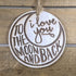 Hand-painted wooden love you to the moon and back Christmas ornament featuring a crescent moon design with heartfelt lettering and celestial details, sentimental holiday decor for couples and meaningful gift-giving by Cate’s Concepts