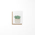 Small greeting card featuring a succulent cactus plant in a pot with a brown Kraft envelope