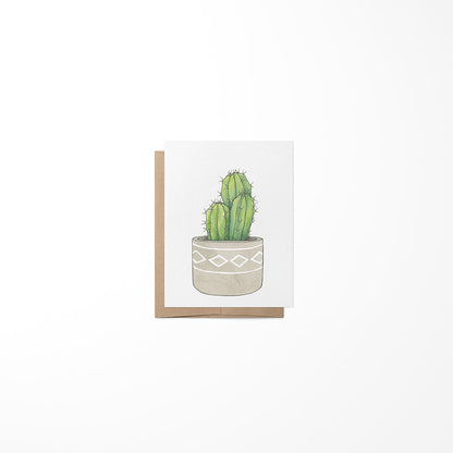 A greeting card featuring a drawing of a tall cactus in a pot, with a plain background.