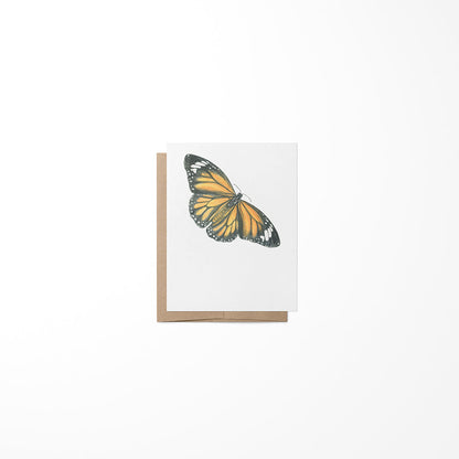 Greeting card with a monarch butterfly design on a white background