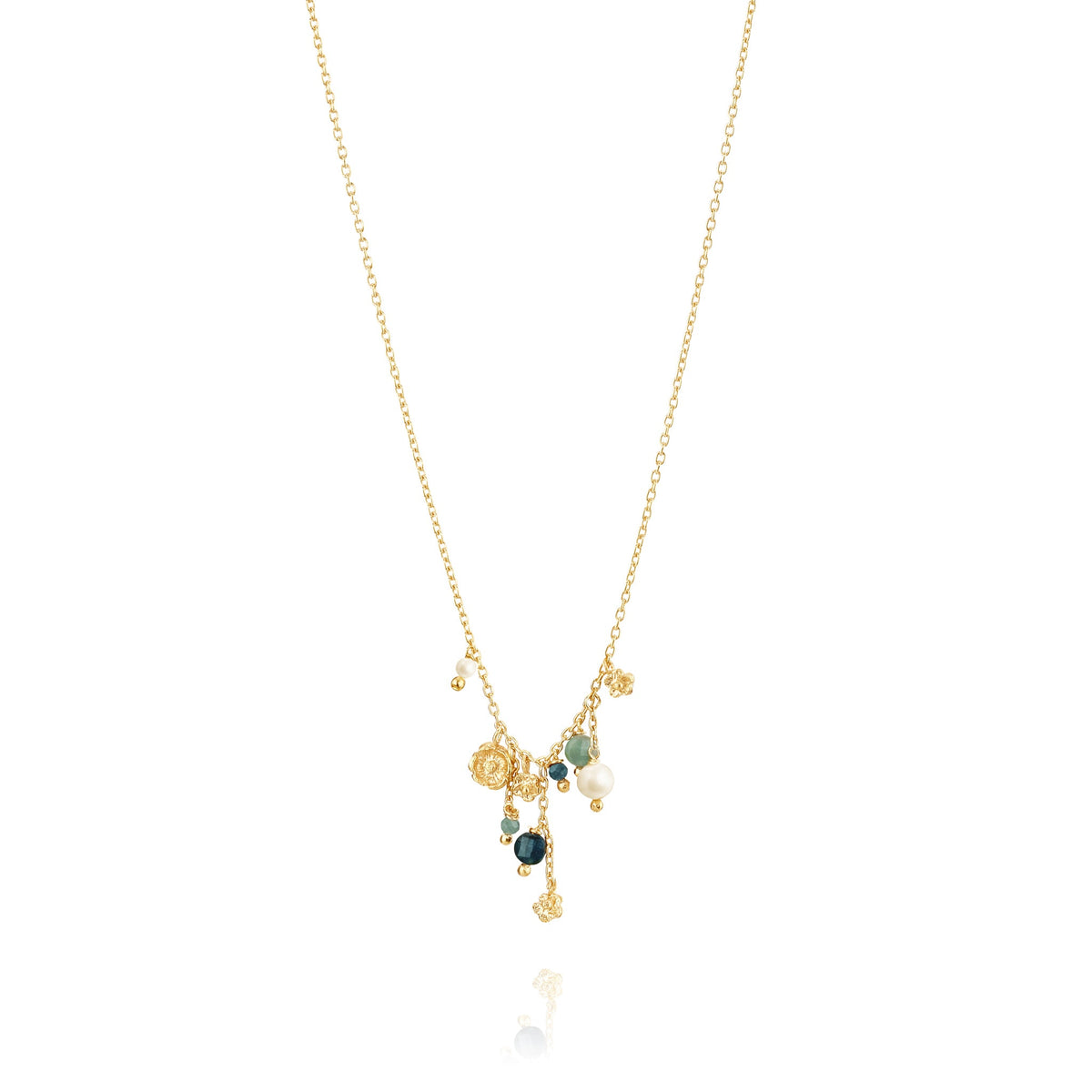 Gold flower and gemstone cluster necklace, made by artisans in portugal, flat lay, chicago ethical necklace jewelry