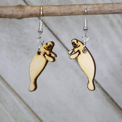Hand-painted wooden manatee dangle earrings with realistic sea life design and hypoallergenic sterling silver hooks, lightweight manatee statement jewelry earrings for ocean lovers and marine animal fans