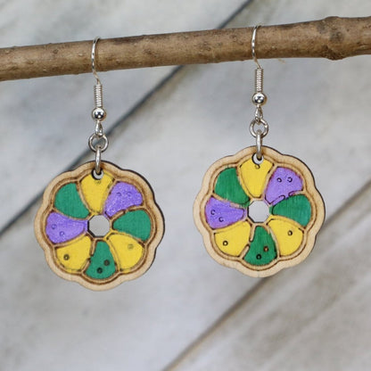 Hand-painted wooden Mardi Gras king cake dangle earrings with festive Louisiana dessert design and hypoallergenic sterling silver hooks, lightweight king cake statement jewelry earrings for New Orleans carnival style