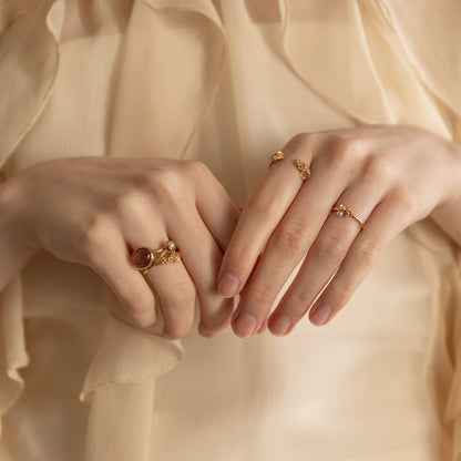 Artisan handmade gold rings on model