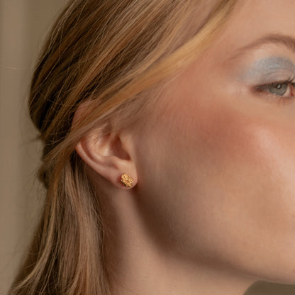 Ethical jewelry earrings, on model