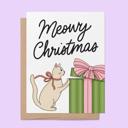 Meowy Christmas Card flat lay — illustrated Christmas card for cat parents by indie artist MangoIllustrated