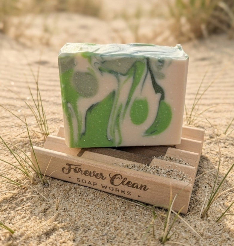 Bar of soap on a soap deck on a sand dune 