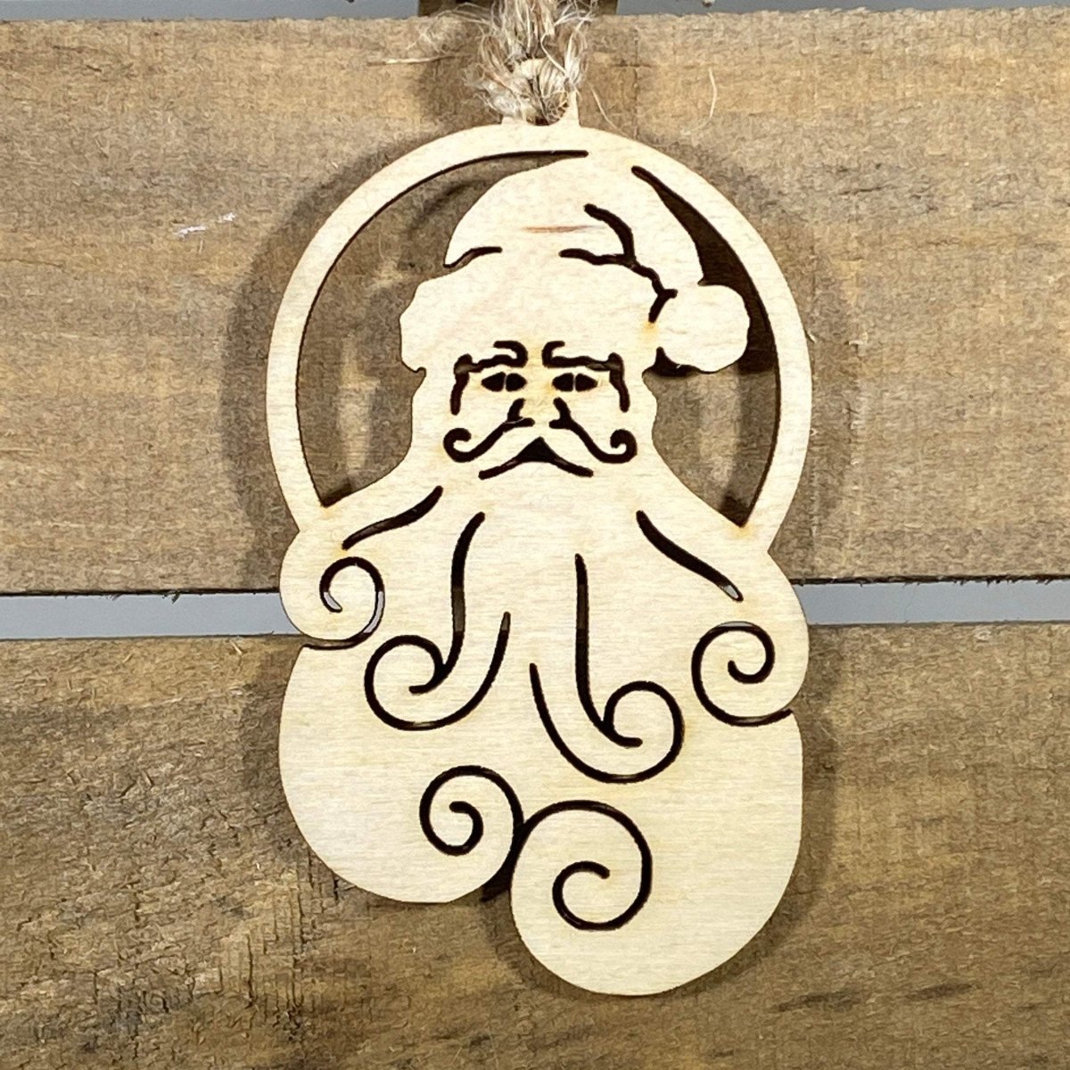 Hand-painted wooden natural wood Santa Christmas ornament featuring a rustic Santa design with visible wood grain and classic holiday details, cozy decor for farmhouse homes and traditional Christmas lovers by Cate’s Concepts
