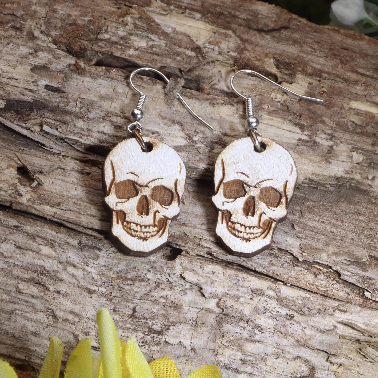Natural wood skull dangle earrings with detailed engraved human skull design, lightweight gothic anatomy jewelry for skull and oddities lovers