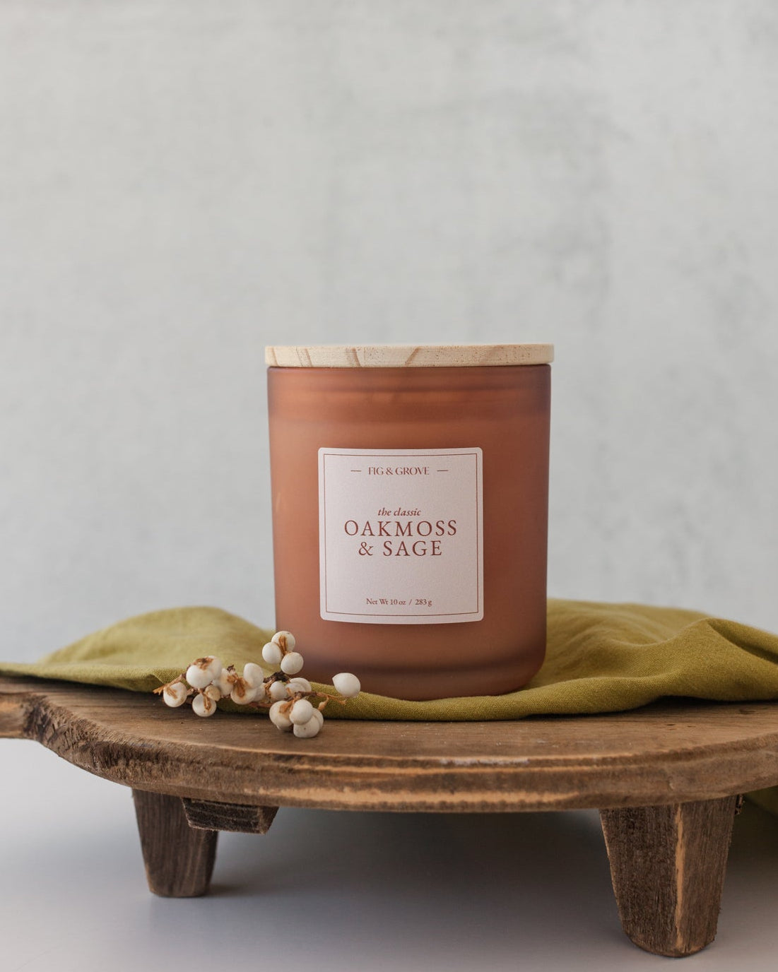 Hand-poured Oak Moss &amp; Sage candle in frosted glass vessel – earthy essential oil blend with notes of sage, citrus, and oakmoss