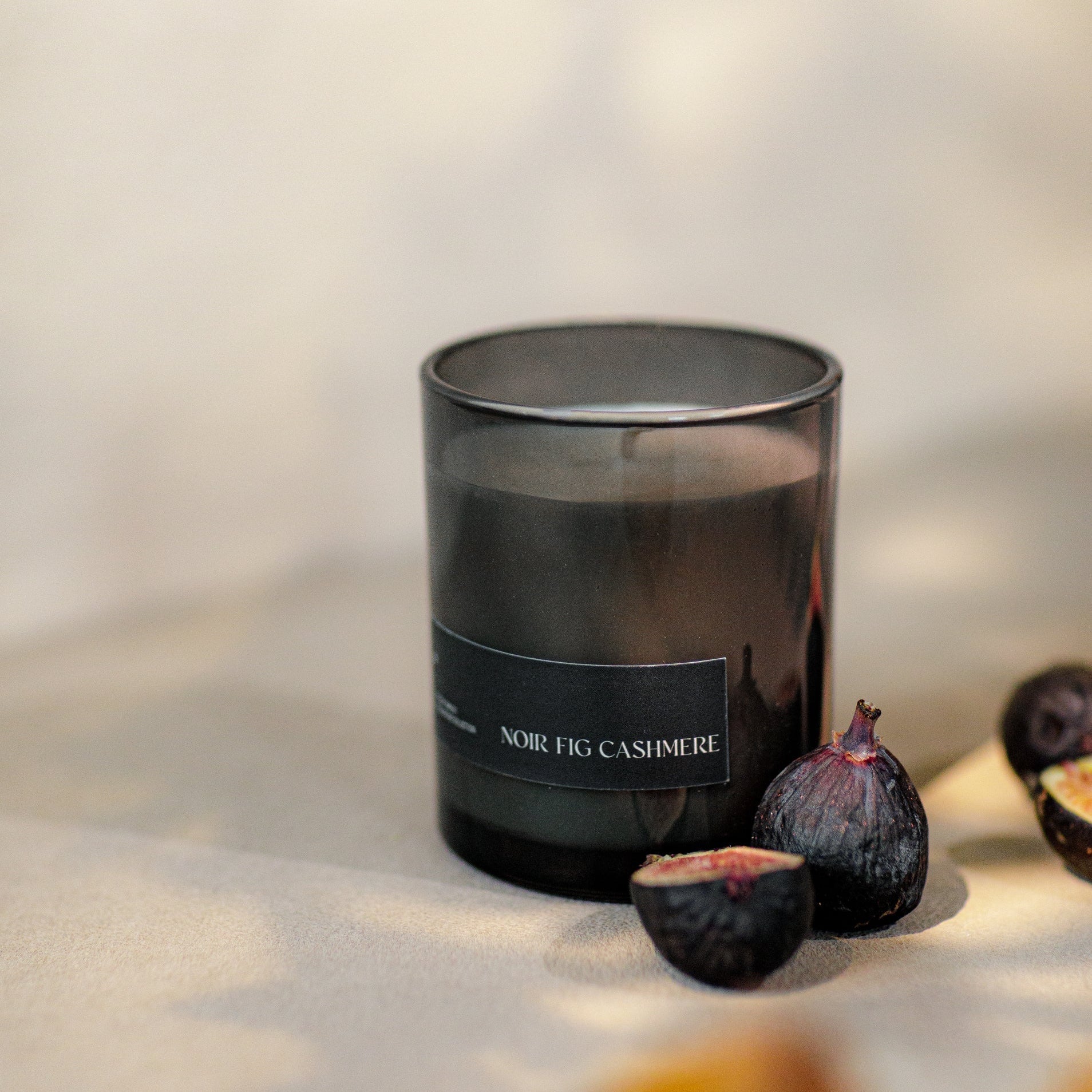 Black candle labeled &
