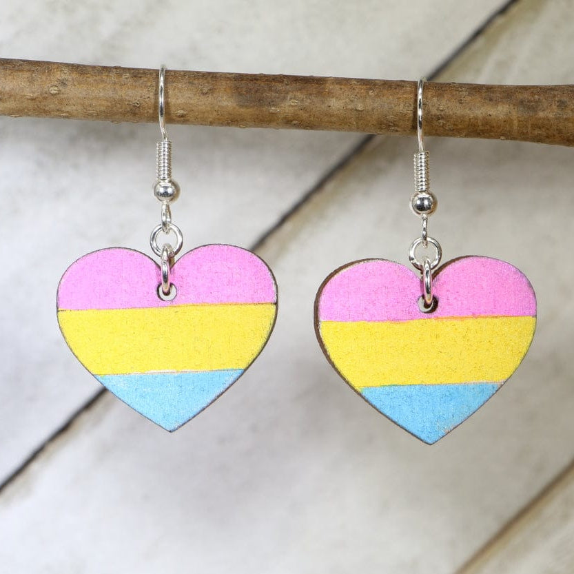 Hand-painted wooden pansexual heart dangle earrings with vibrant LGBTQ pride design and hypoallergenic sterling silver hooks, colorful equality statement jewelry for pride events and everyday expression