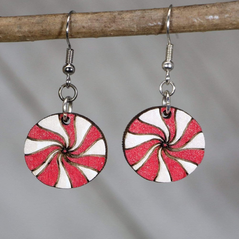 Hand-painted wooden peppermint candy dangle earrings with festive Christmas swirl design and hypoallergenic sterling silver hooks, lightweight candy statement jewelry earrings for holiday and winter style