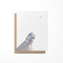 A greeting card featuring a watercolor painting of a pigeon on the front cover, with a blank inside and a kraft envelope.