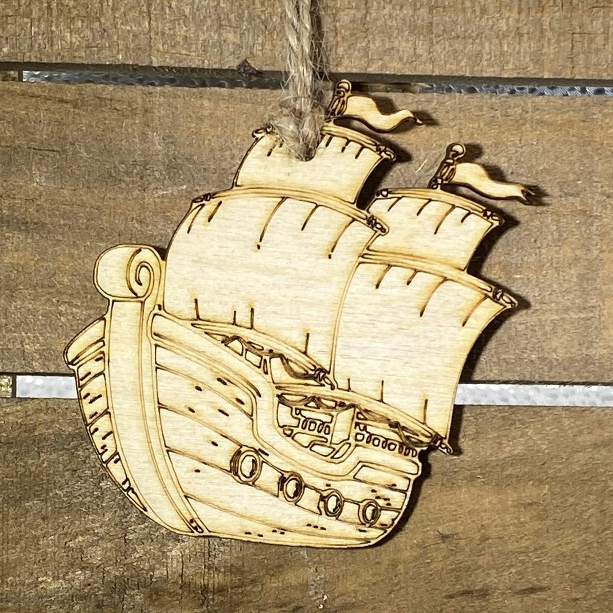 Hand-painted wooden pirate ship Christmas ornament with nautical holiday design and lightweight festive decor, adventurous sea-themed tree decoration for coastal and pirate lover style
