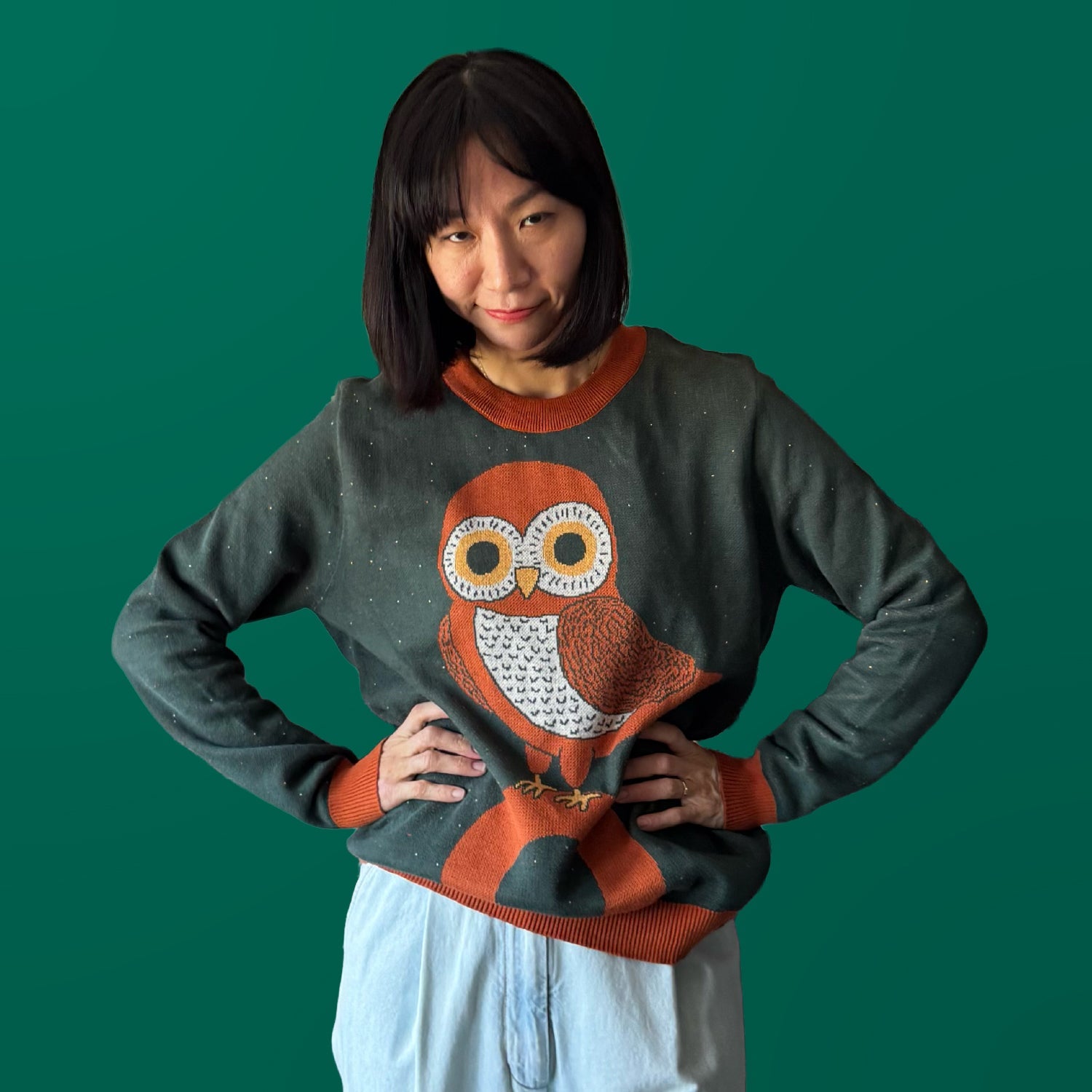 Model wearing the Owl on a Vowel graphic knit sweater — distinctive artist-made designer fashion by Jedd