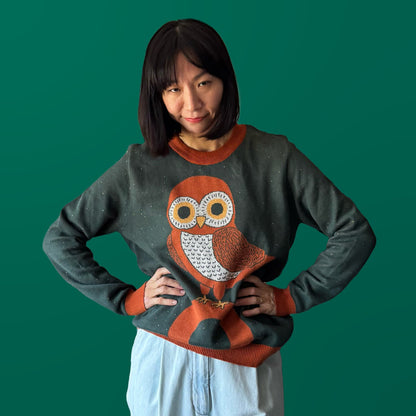 Model wearing the Owl on a Vowel graphic knit sweater — distinctive artist-made designer fashion by Jedd